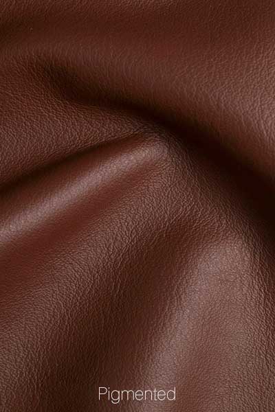 brown and red pigmented leather