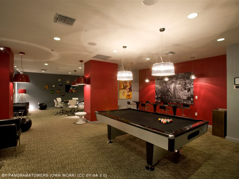 game room with pool table in basement