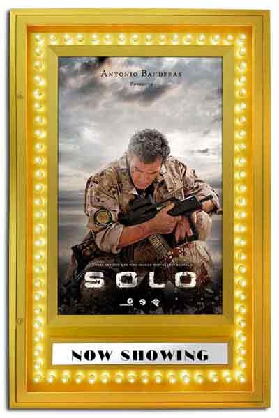gold color movie poster frame with lights around frame