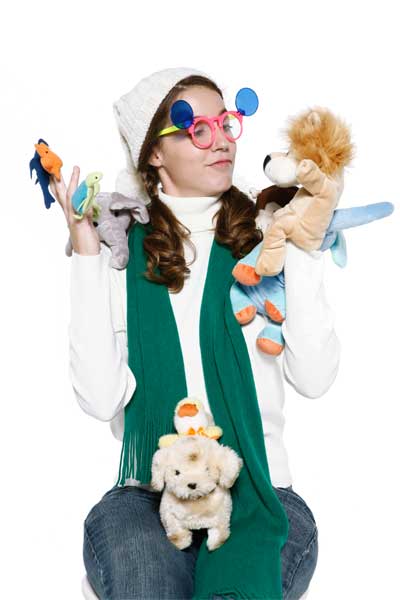 young girl with finger and hand puppets