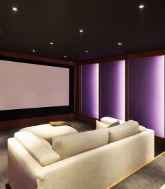 home theater with white couch