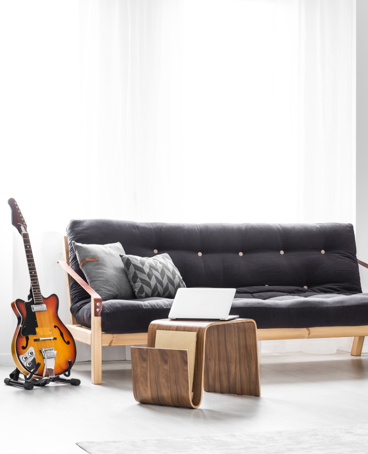 bachelor pad couch and guitar