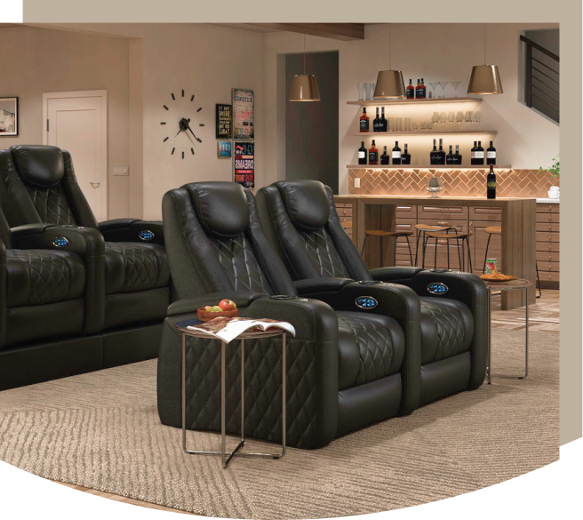 two rows of black recliners home theater