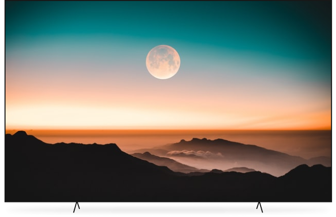 large tv displaying sunset and moon
