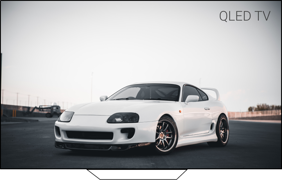 clear qled tv displaying white sports car