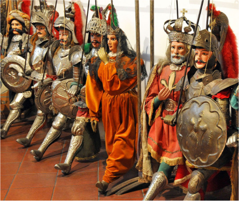 Group of italian puppets, some dressed as knights, and kings