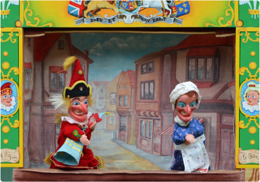 Two european puppets in a city