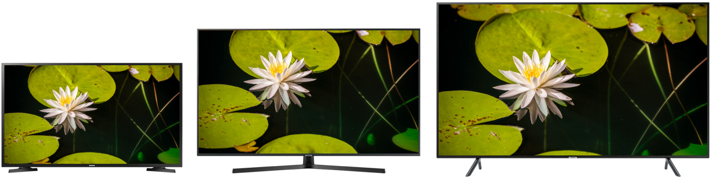 three sized tv's displaying a pond