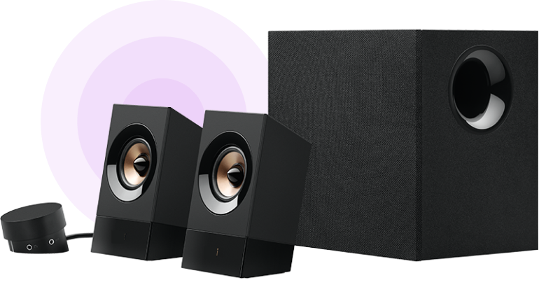 two black speakers and a subwoofer