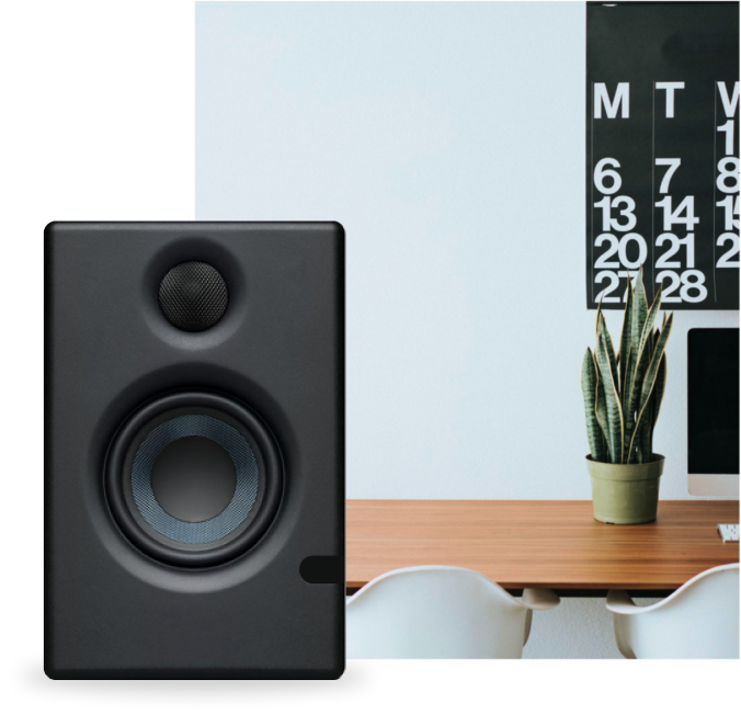 black speaker on a desk