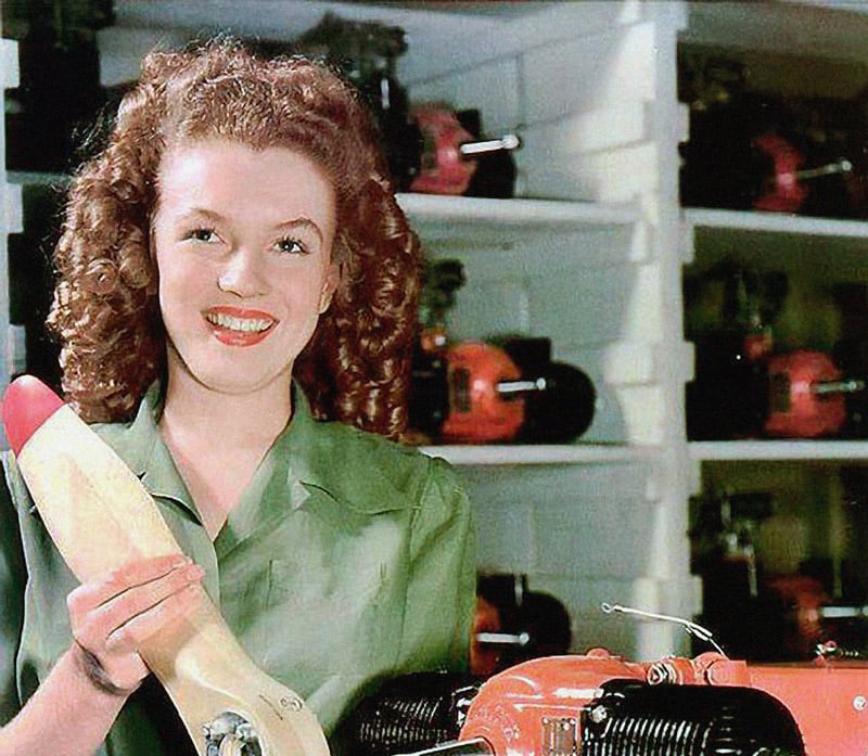 Norma Jean holding a propeller